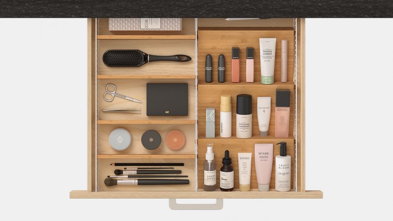 overhead photo of adjustable drawer organizer with makeup