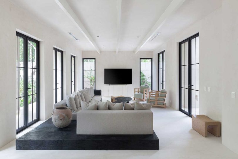 modern neutral living room with windows