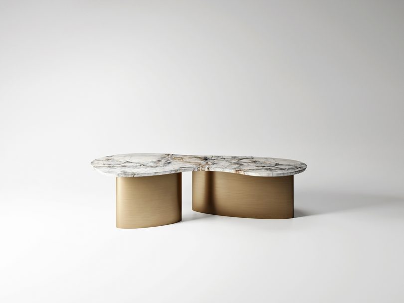 metal and marble coffee table on white background