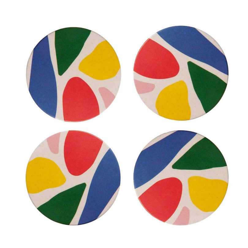 bamboo coasters with a colorful abstract pattern