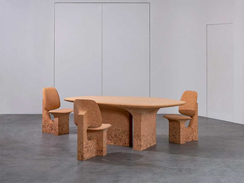 burnt cork table with three chairs