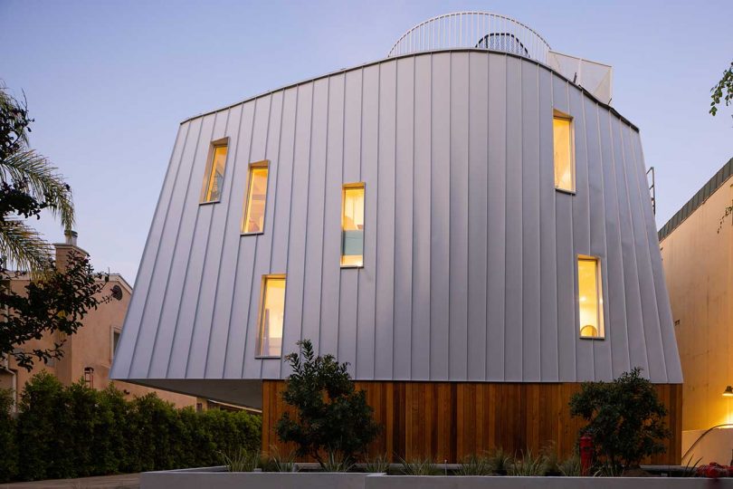 curved metal exterior of house