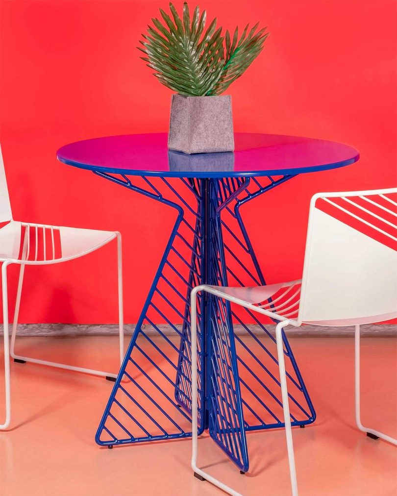 electric blue wire table with fluorescent background