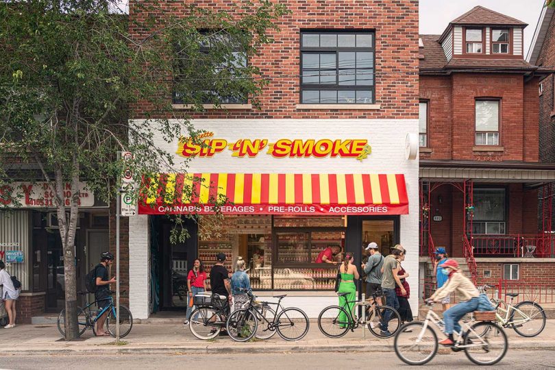 smoke shop exterior with yellow and red store logo