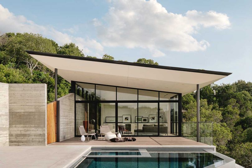 A Boomerang-Shaped House With Canyon and City Views of Austin