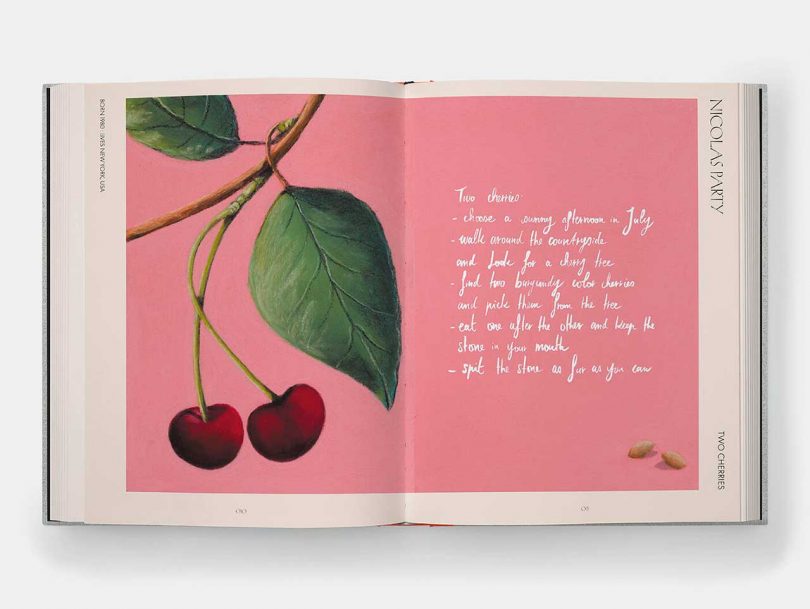 book layout of cherries and writing