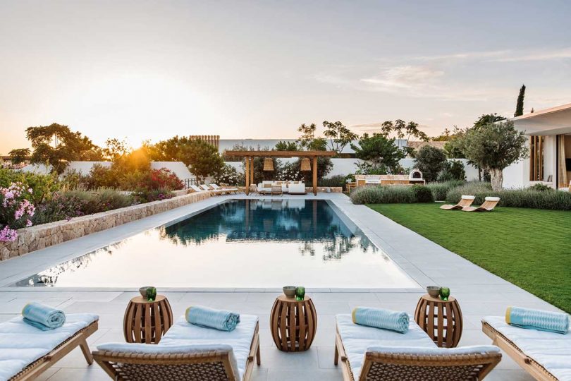 swimming pool with modern wood furniture