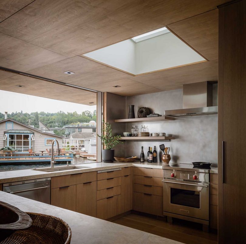 modern kitchen in floating house looking out to water