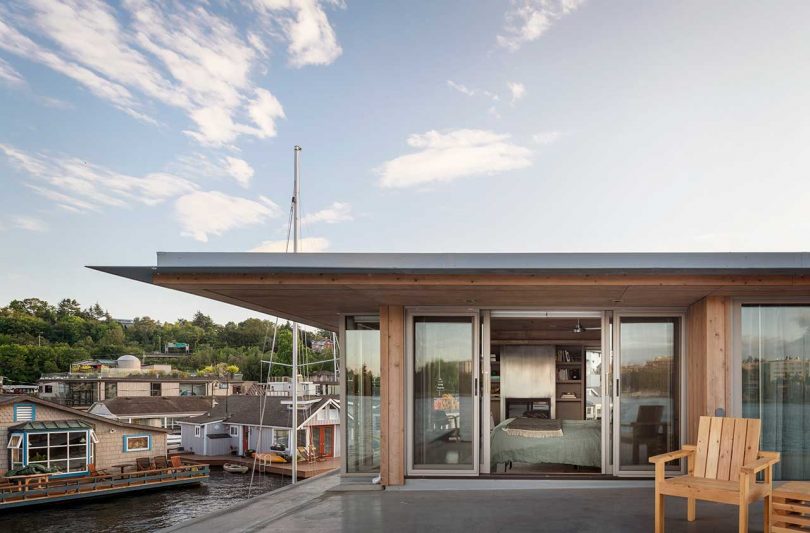 exterior view into modern bedroom of floating house