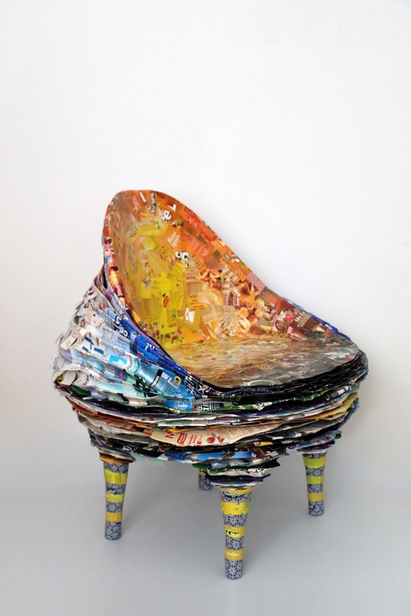 colorful layered and collaged chair in light interior space