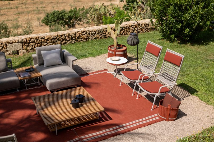 outdoor furniture on a patio overlooking the countryside
