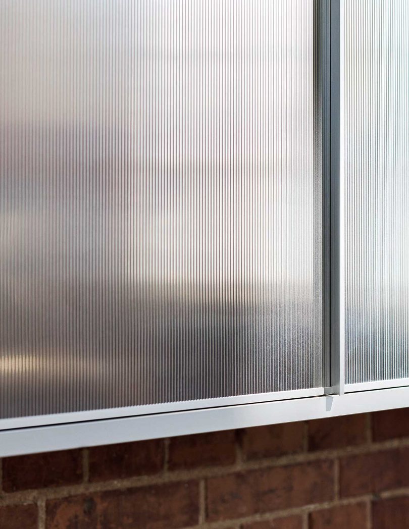 surface of reflective kitchen cabinet doors