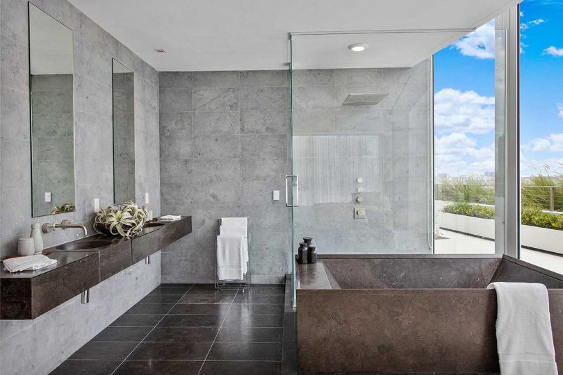 modern bathroom in wood and gray tones