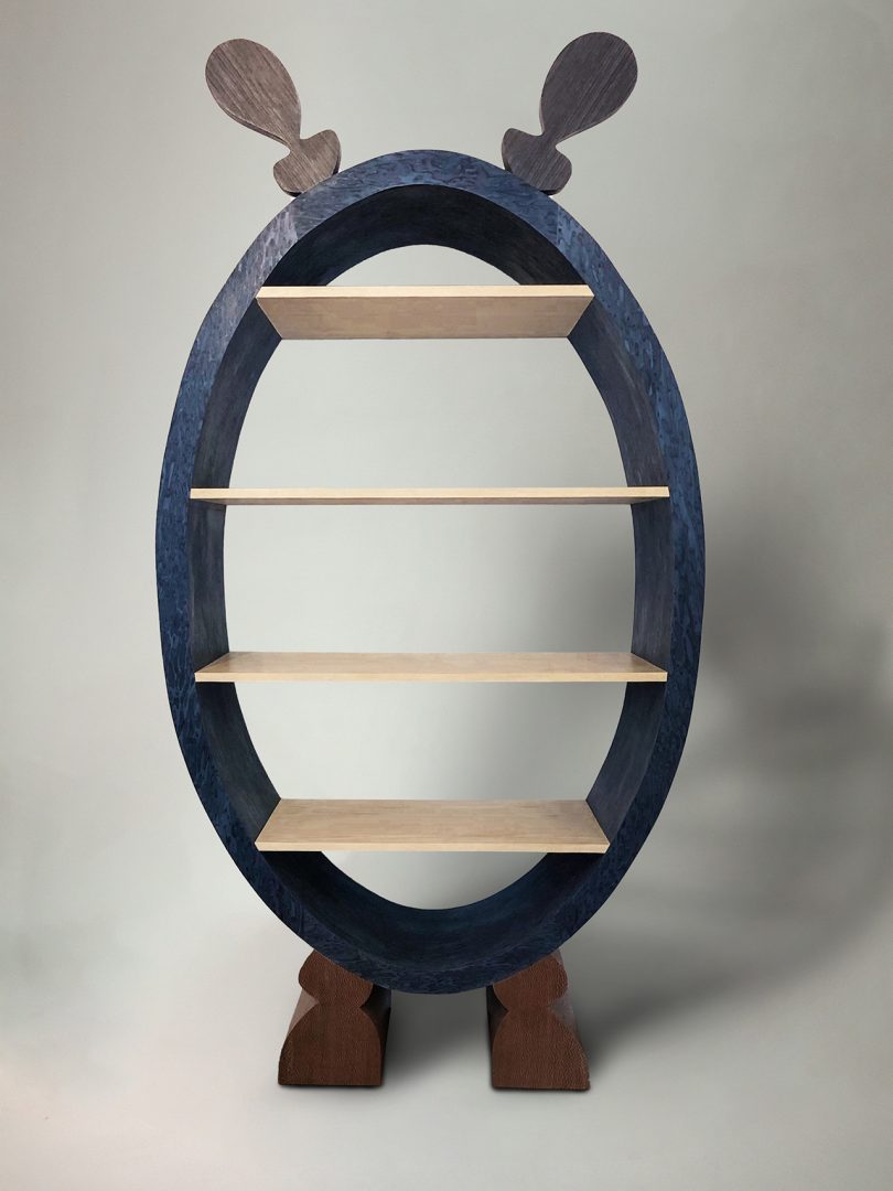 oval shaped shelves in navy blue and light wood