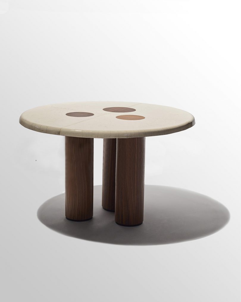 wooden table with cylindrical legs