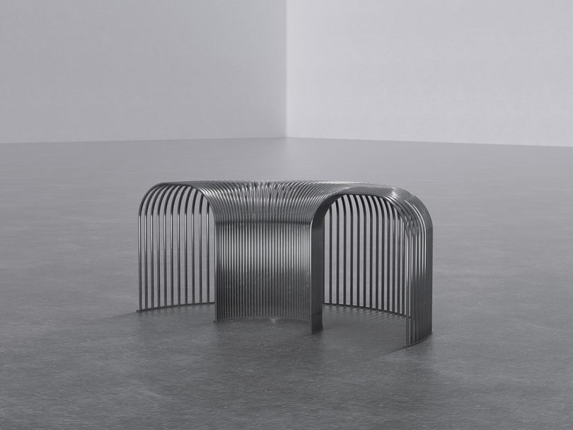 curved wire bench in white gallery setting