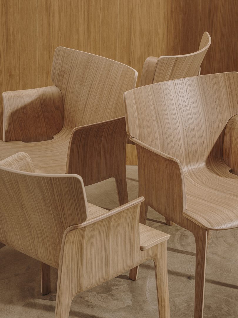 four wood armchairs