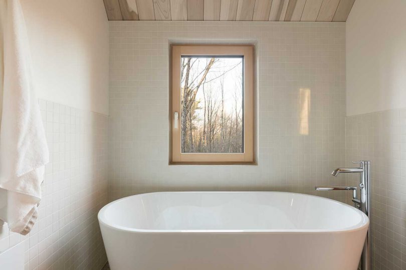 modern minimalist bathroom in shades of white and gray