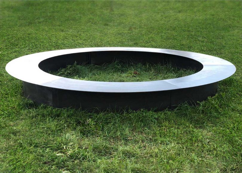 metal ring bench in grass
