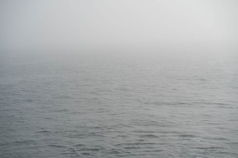 open water covered in fog