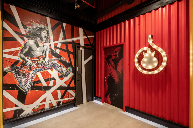 interior space with red walls and a mural of David Lee Roth