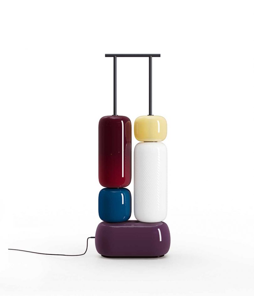 colorful sculptural lamp on a white background