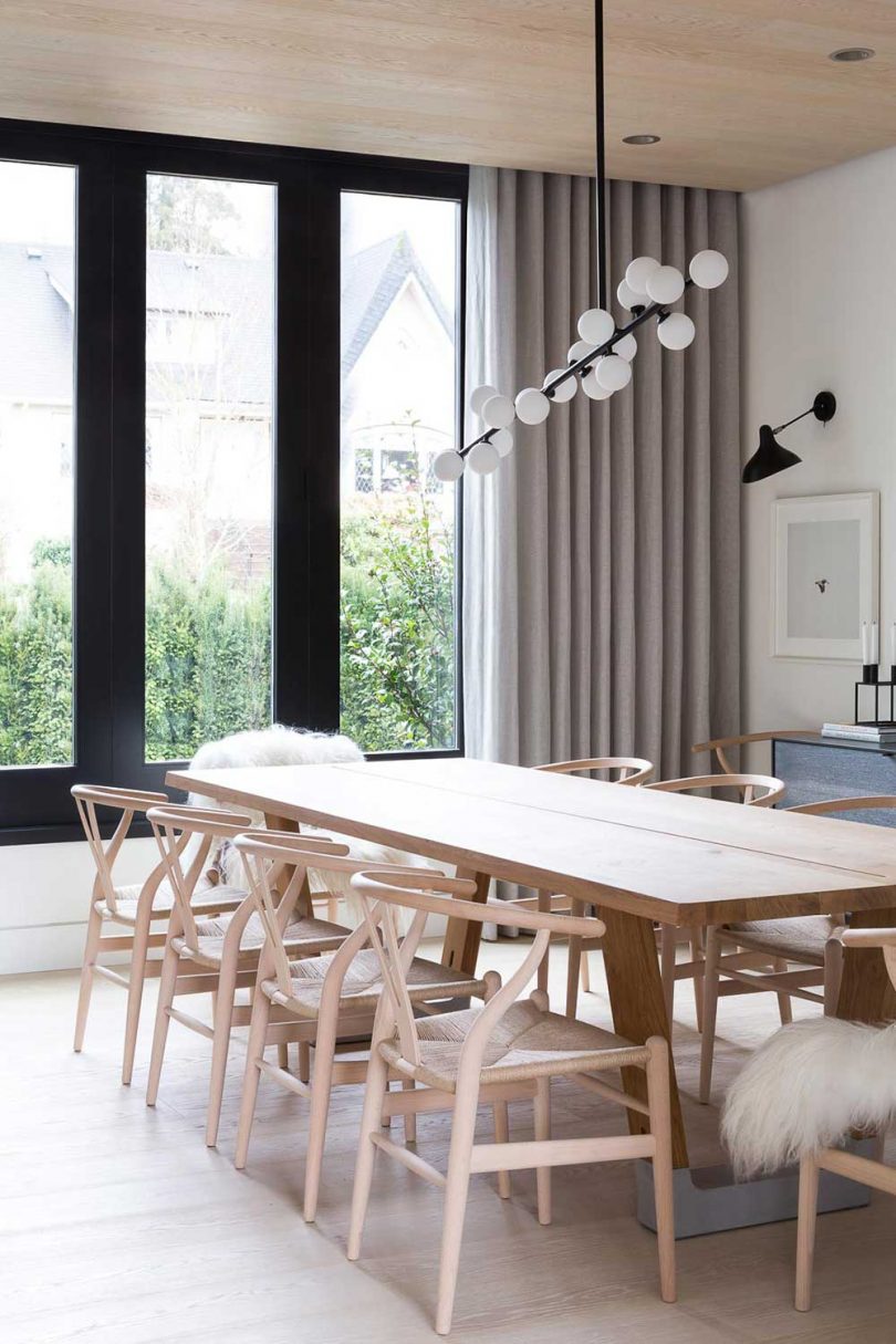 modern dining room with wood table and chairs