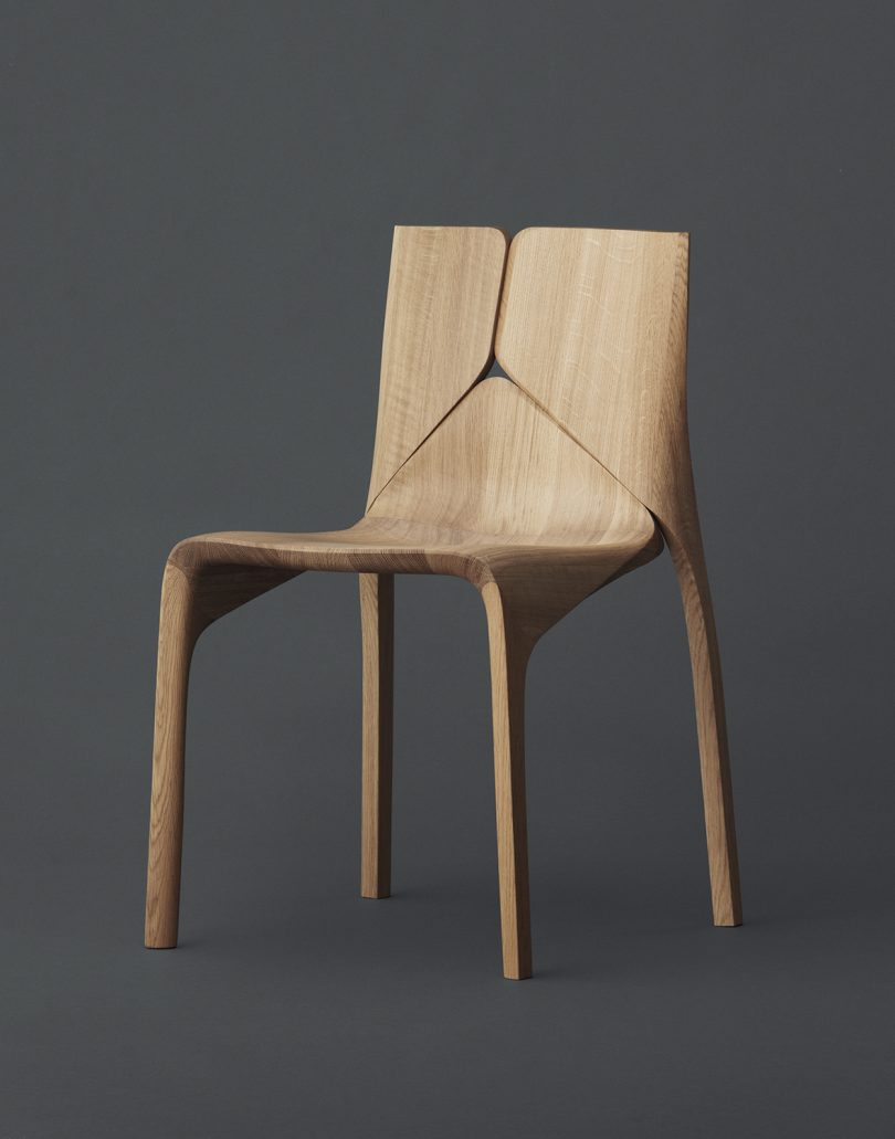 wood dining chair on grey background