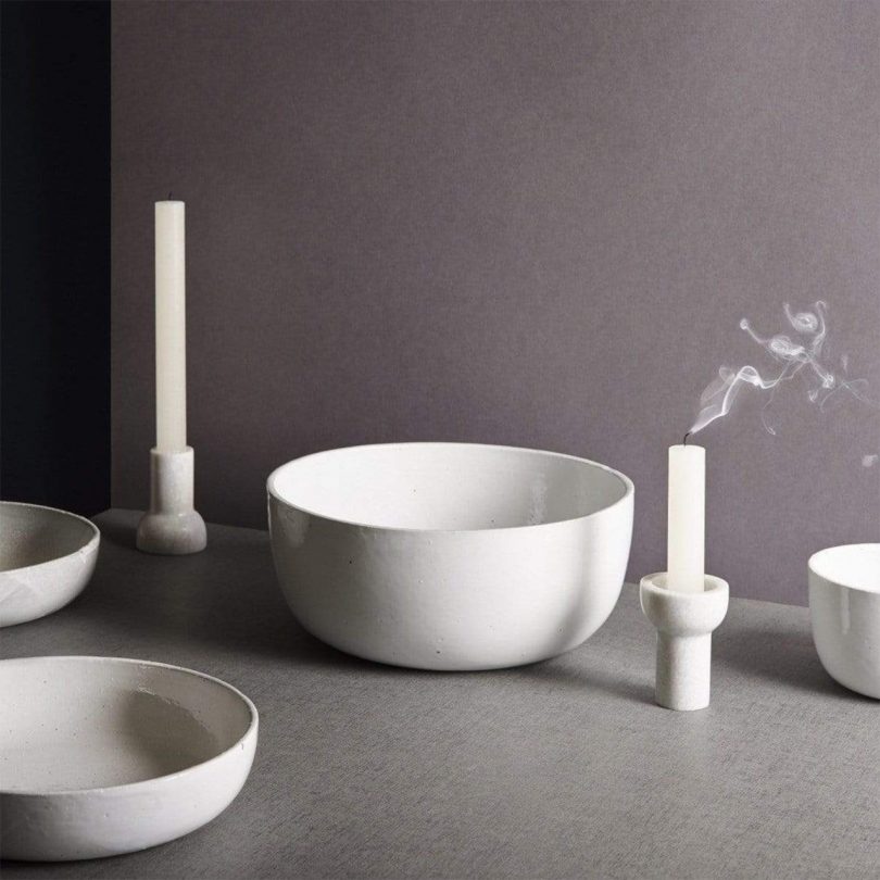 Aaron Probyn Como Candle Holders on a table setting with bowls on a dark grey background