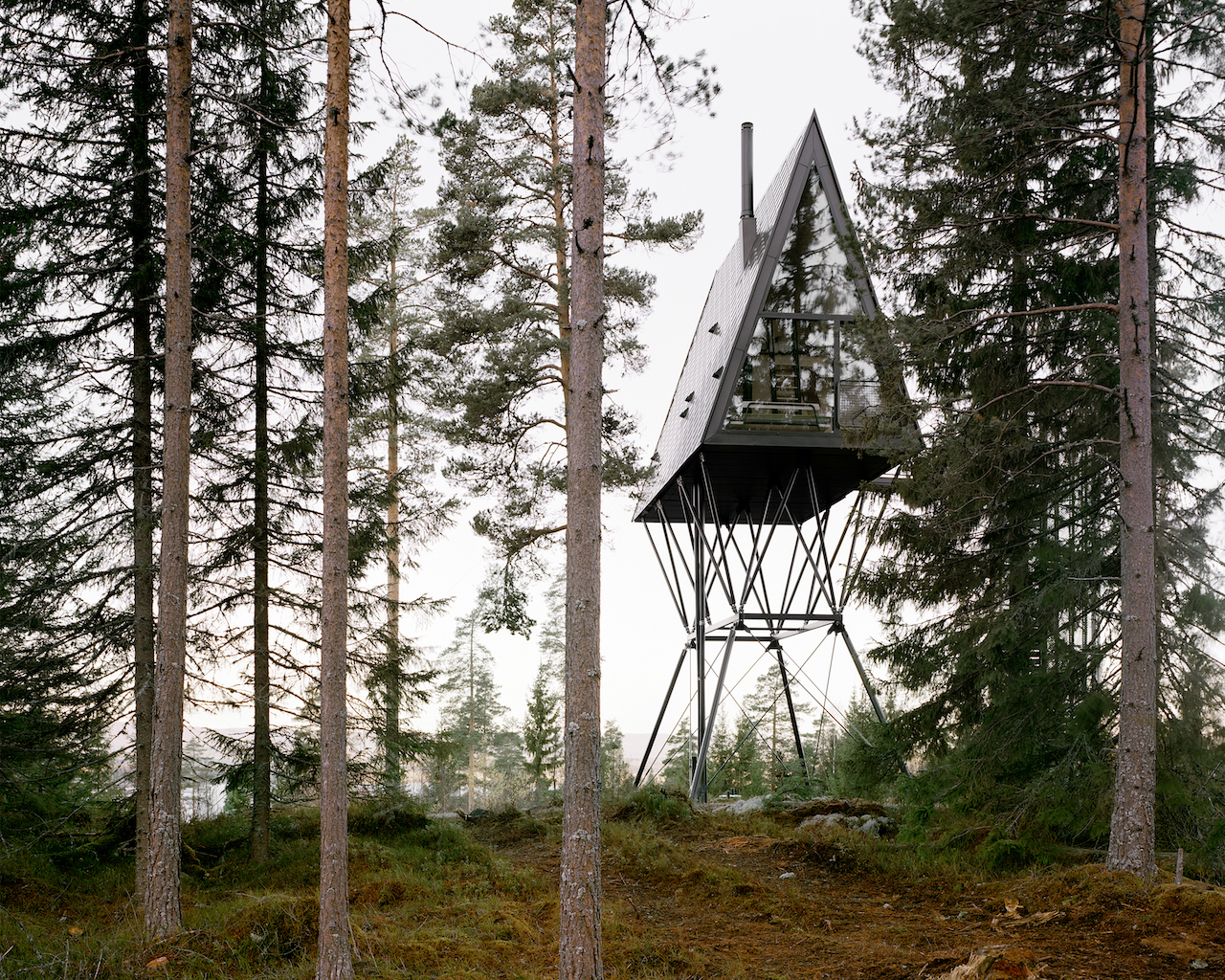 A-Frame Cabins on Stilts Let You Cozy Up in the Trees of a Finnish Forest