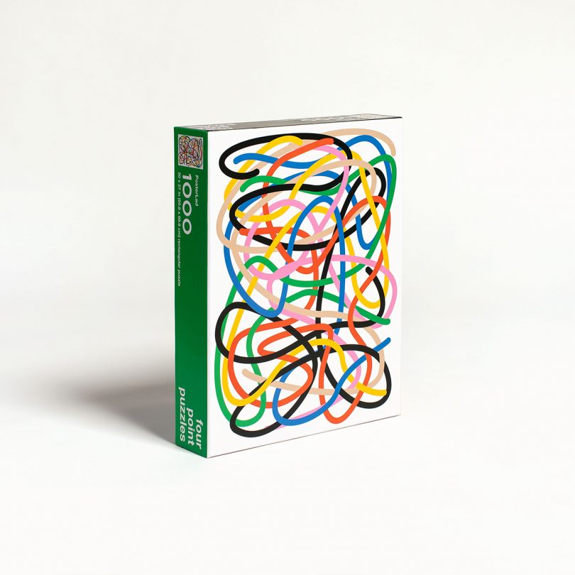four point puzzles "tangled" puzzle in a box on a white background