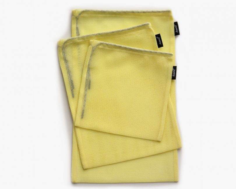 junes carry all set in pale yellow on a white background