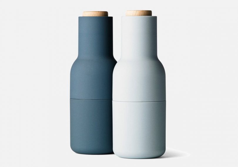 small bottle grinders by MENU in dark blue and light blue on a light grey background
