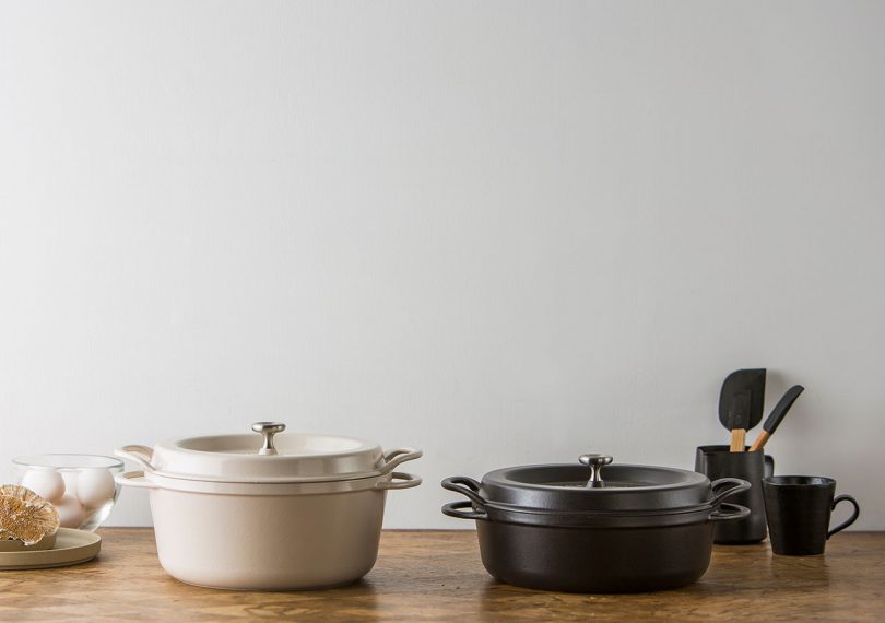 vermicular Japanese cast iron oven pot in black and white on a kitchen counter