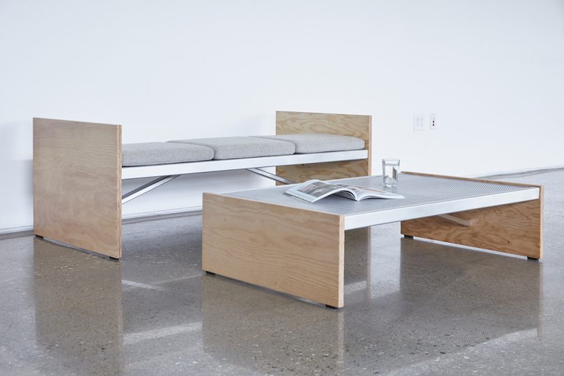 metal and wood bench and table on concrete floor