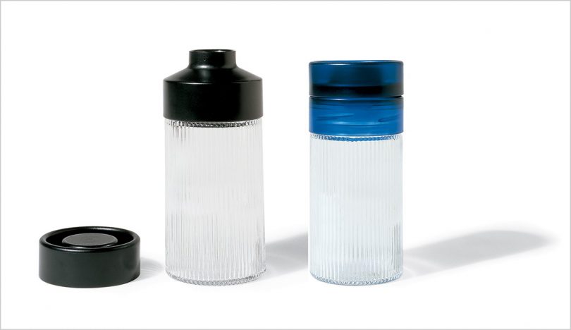 two cocktail shakers side by side on white background