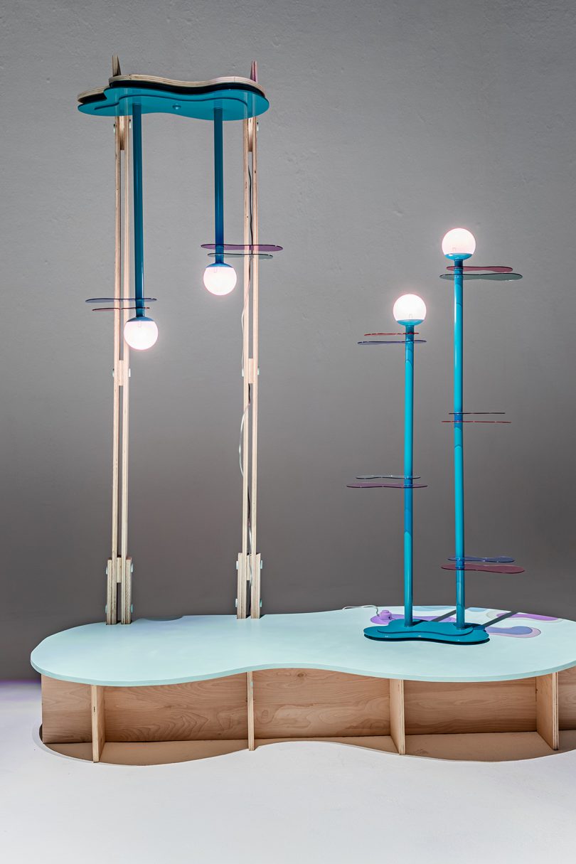 tall blue sculptural lamp and pendant light