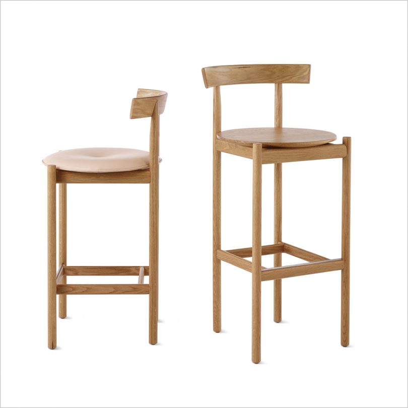 two sizes of wood stools on white background