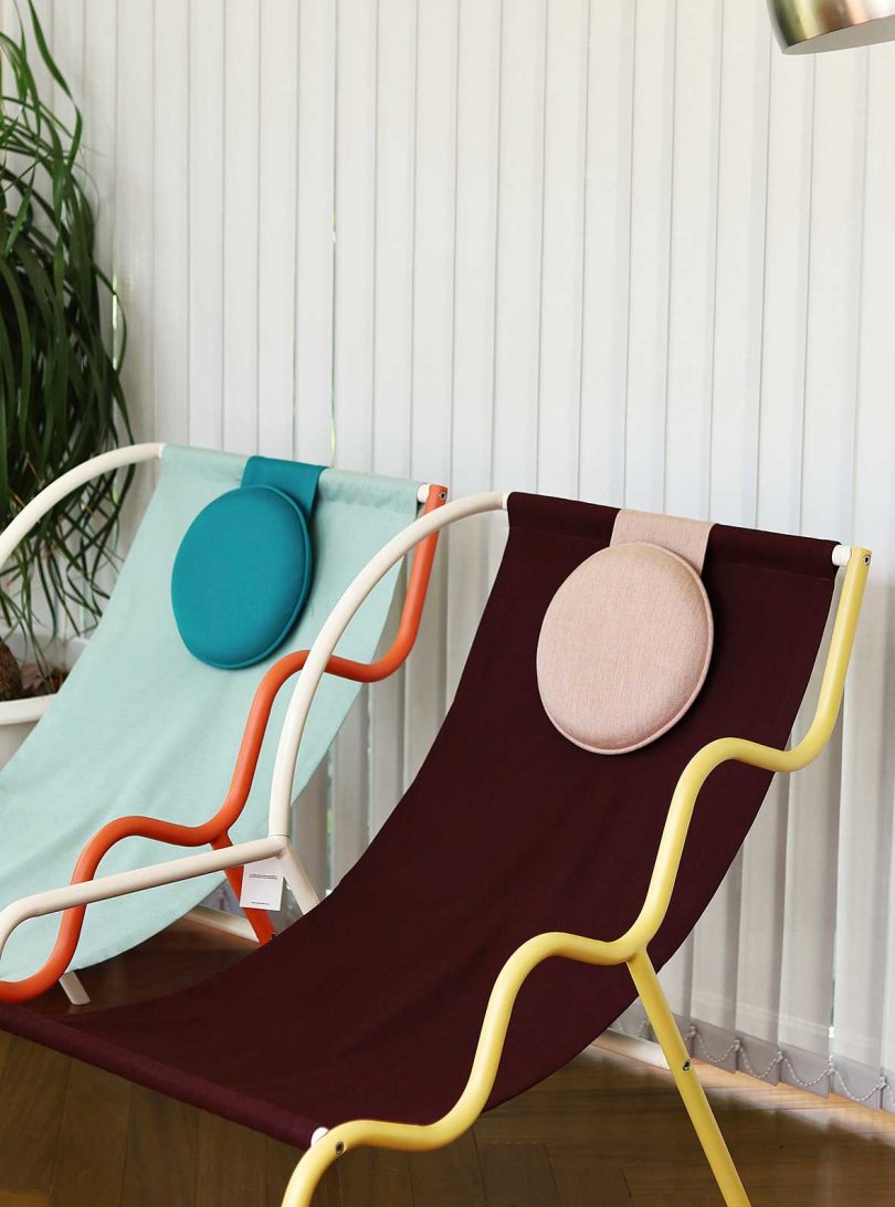 detail of two colorful geometric slingback chairs