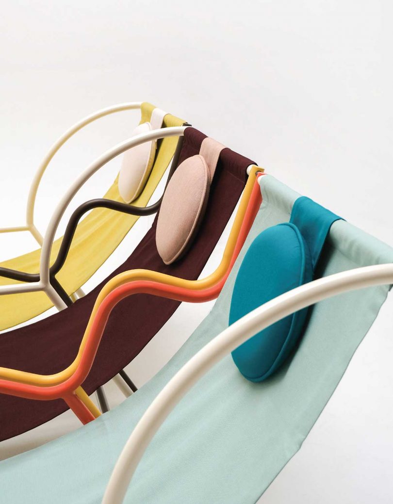 detail of three colorful geometric slingback chairs