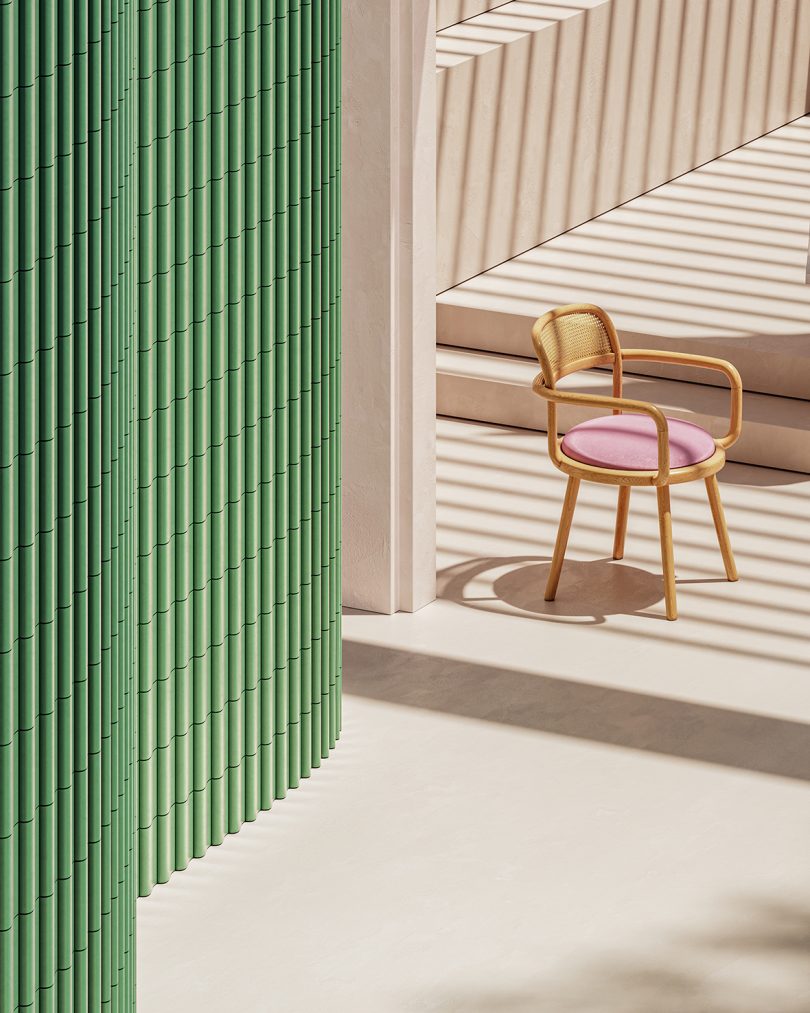 green tiled wall and deck with armchair