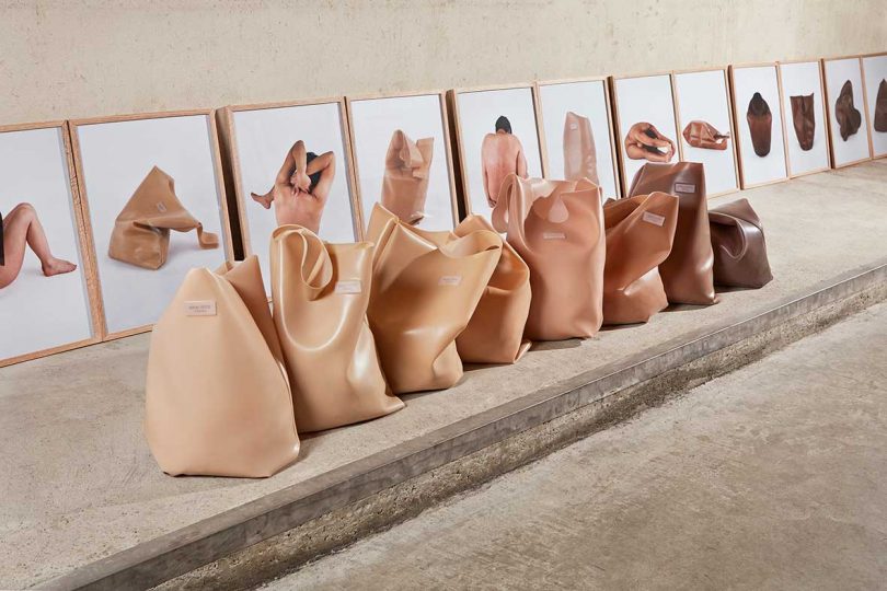nude colored shopping bags of different shades lined up in a row