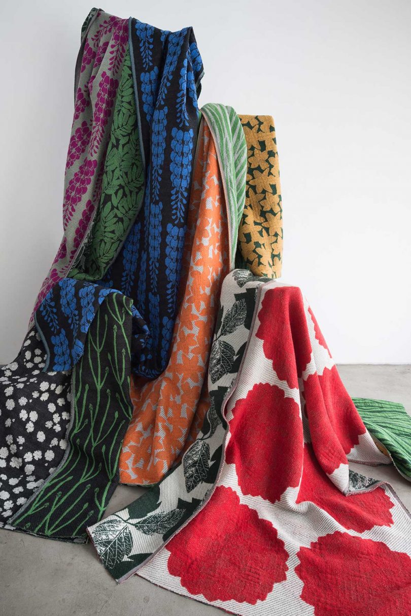 bright, patterned textiles draped over unseen object