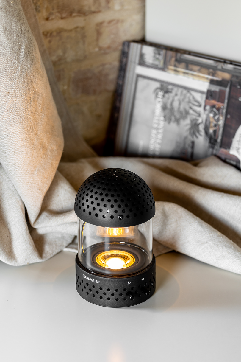 lit speaker/lantern combo styled indoors