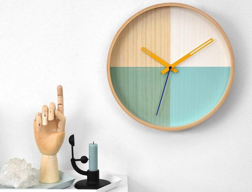 Flor Turquoise Wall Clock by cloudnola