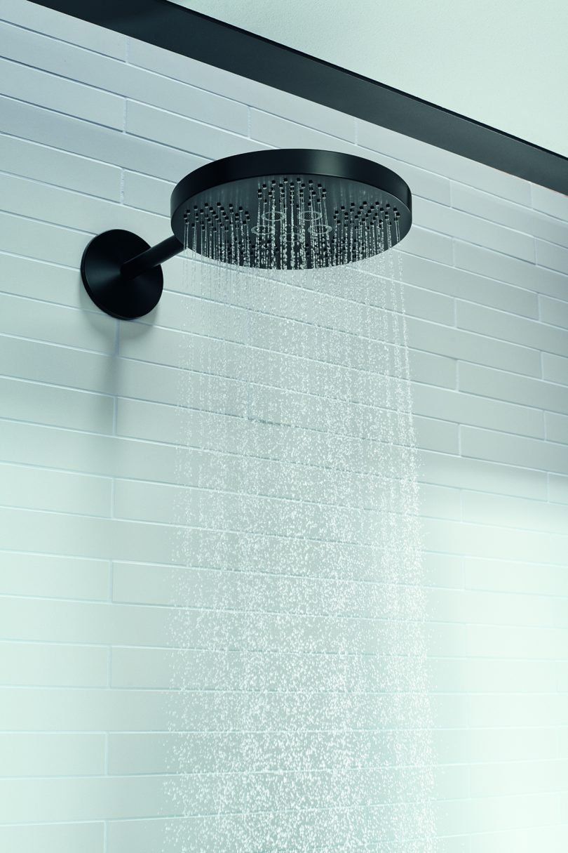 black shower head turned on