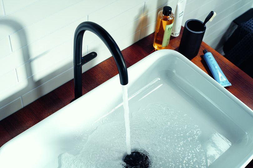 white sink with black fixture