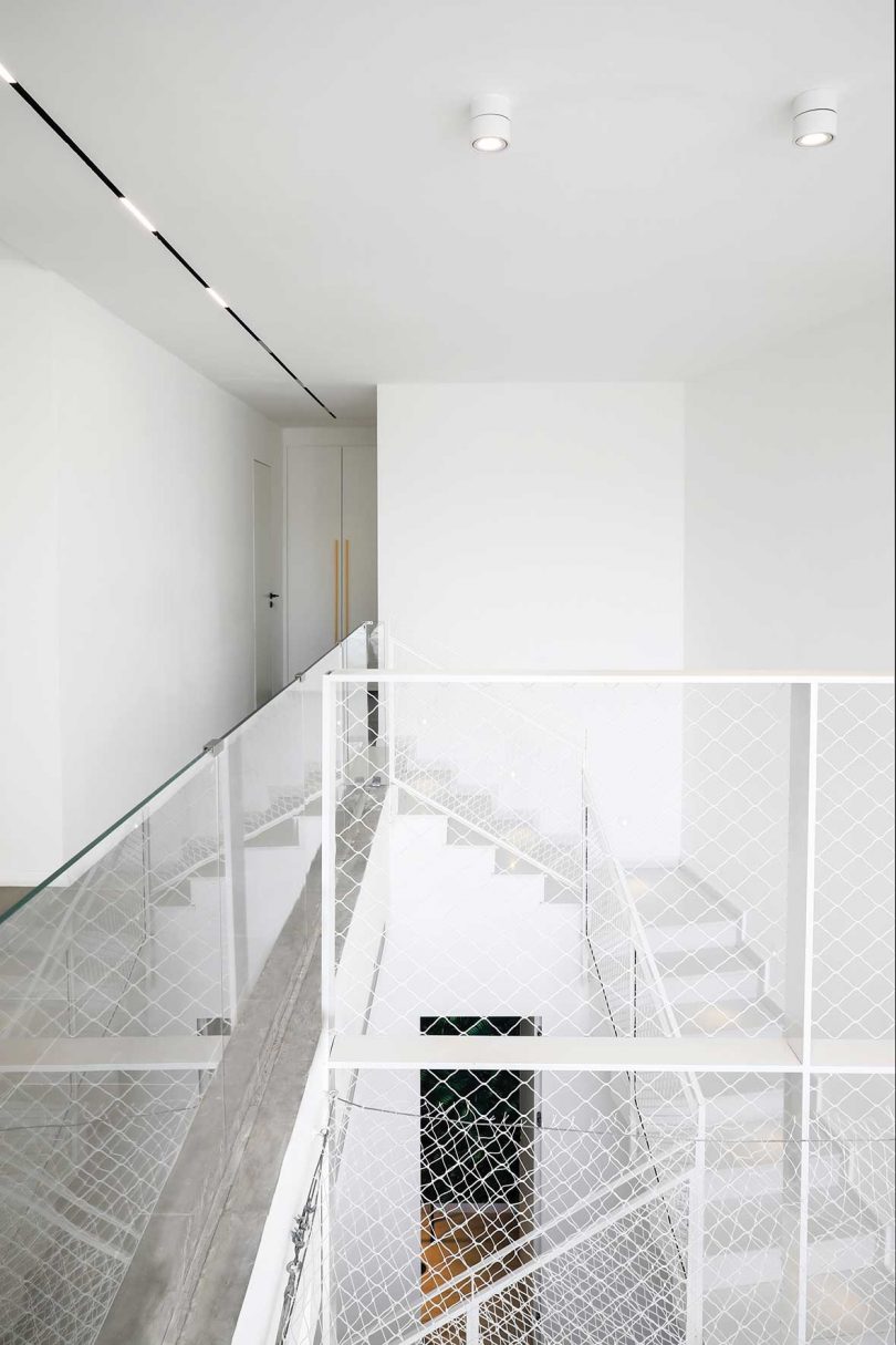 modern white interior with stairs