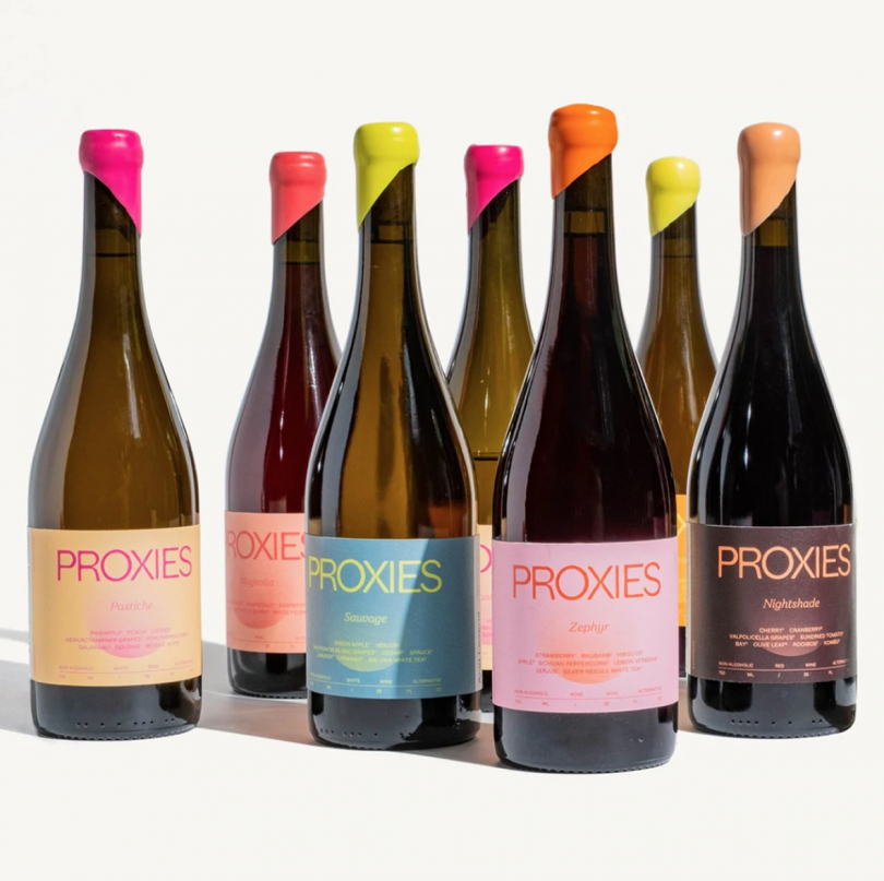 seven bottles with colorful labels and seals