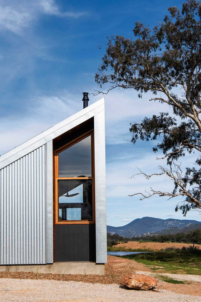 daytime shot of angular cabin with steel roof